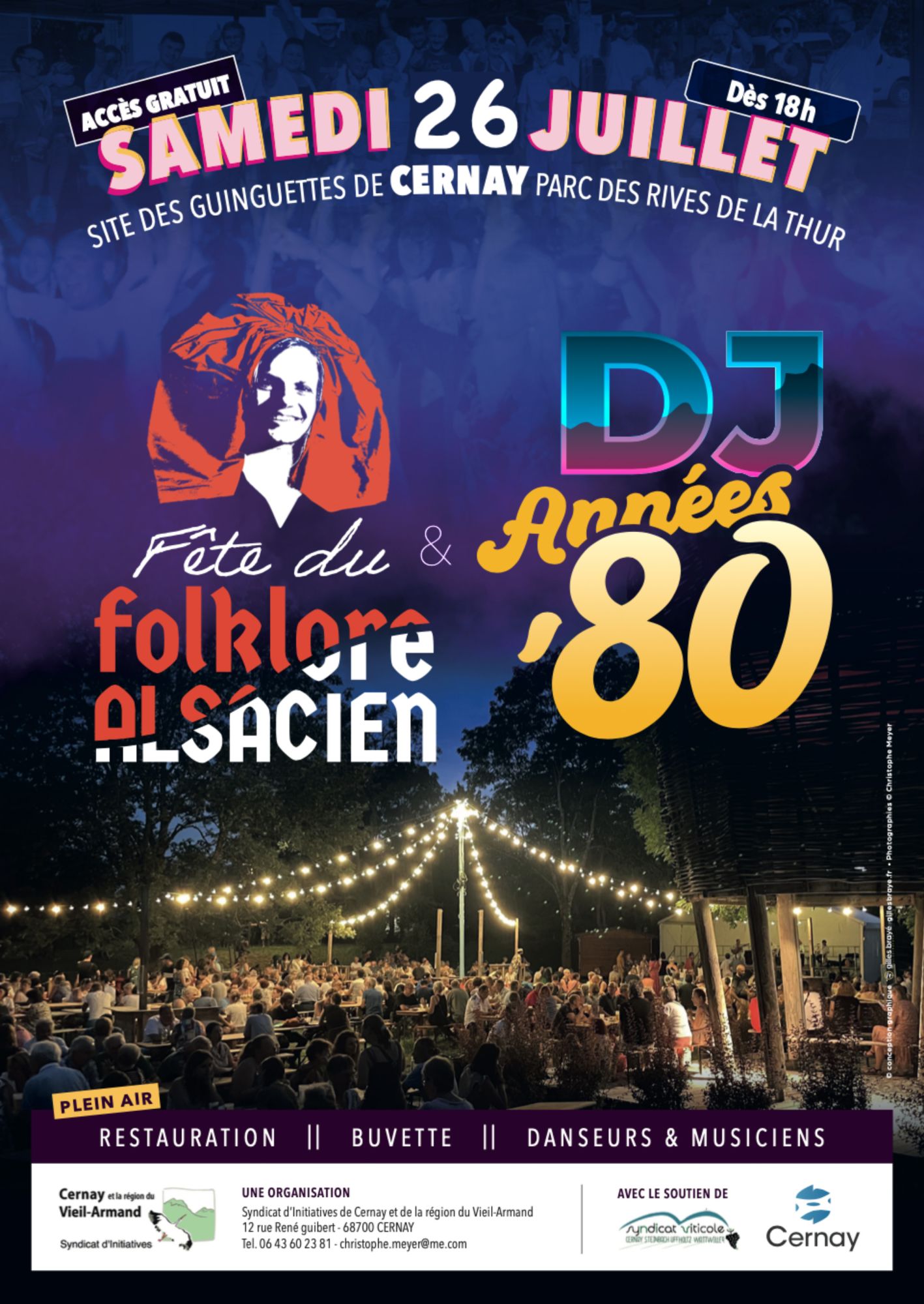 On y voit les lumières de la Guinguette Na'Thur de Cernay et le public
